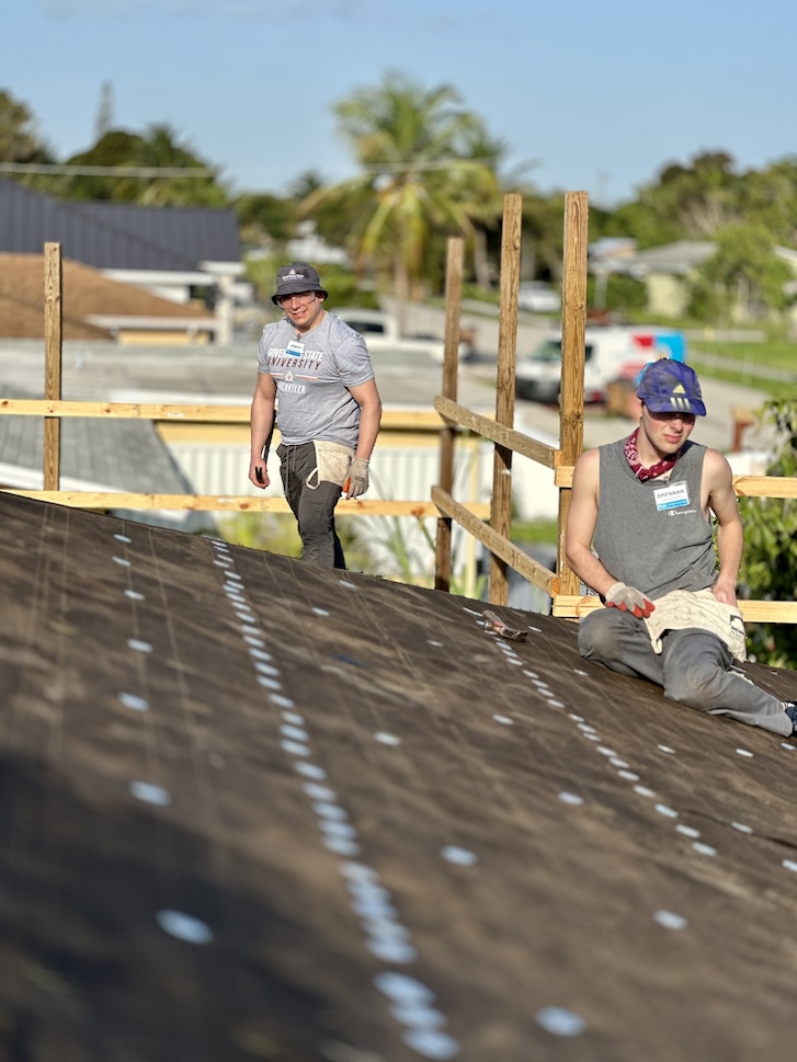 People working on roof